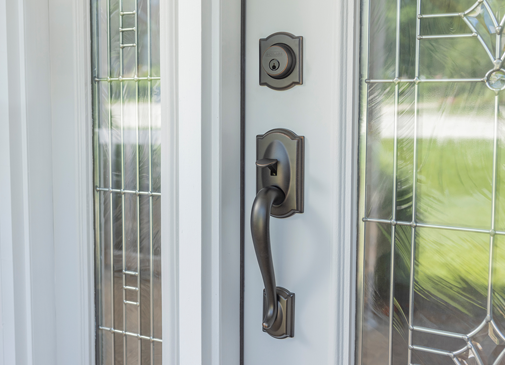 front entry door handle in aged bronze finish