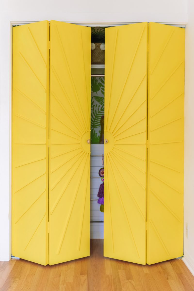 Bifold doors painted canary yellow.