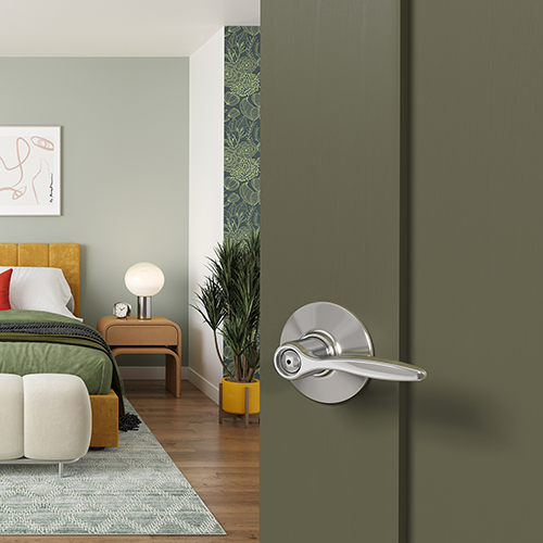 Bedroom door with bright chrome door lever