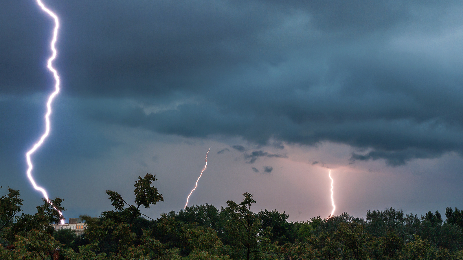 Lightning storm impacting a coastal community.