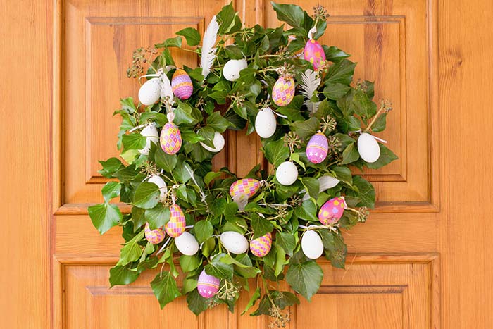 Green wreath with Easter eggs.